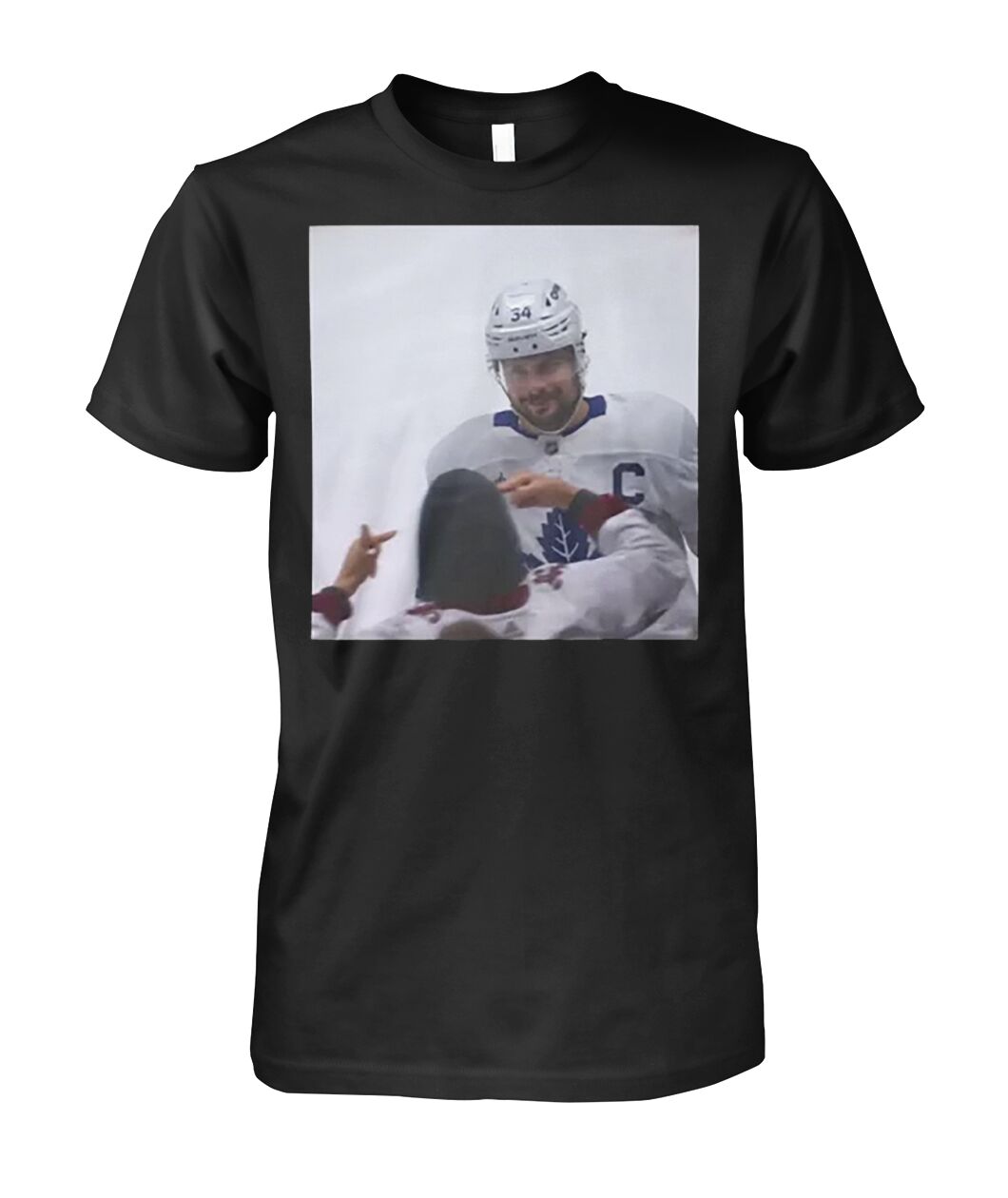 Auston Matthews Smirks At The Avs Fans Shirt
